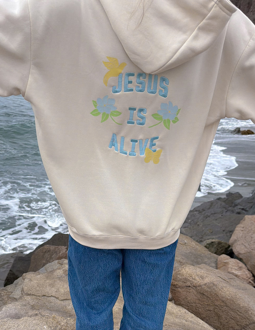 Spread Love – Jesus Is Alive Unisex Hoodie | Embroidered | 70% Cotton | Nimbus Cloud