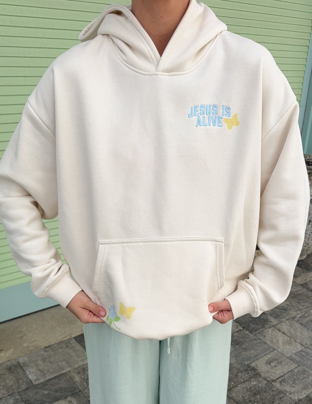 Spread Love – Jesus Is Alive Unisex Hoodie | Embroidered | 70% Cotton | Nimbus Cloud